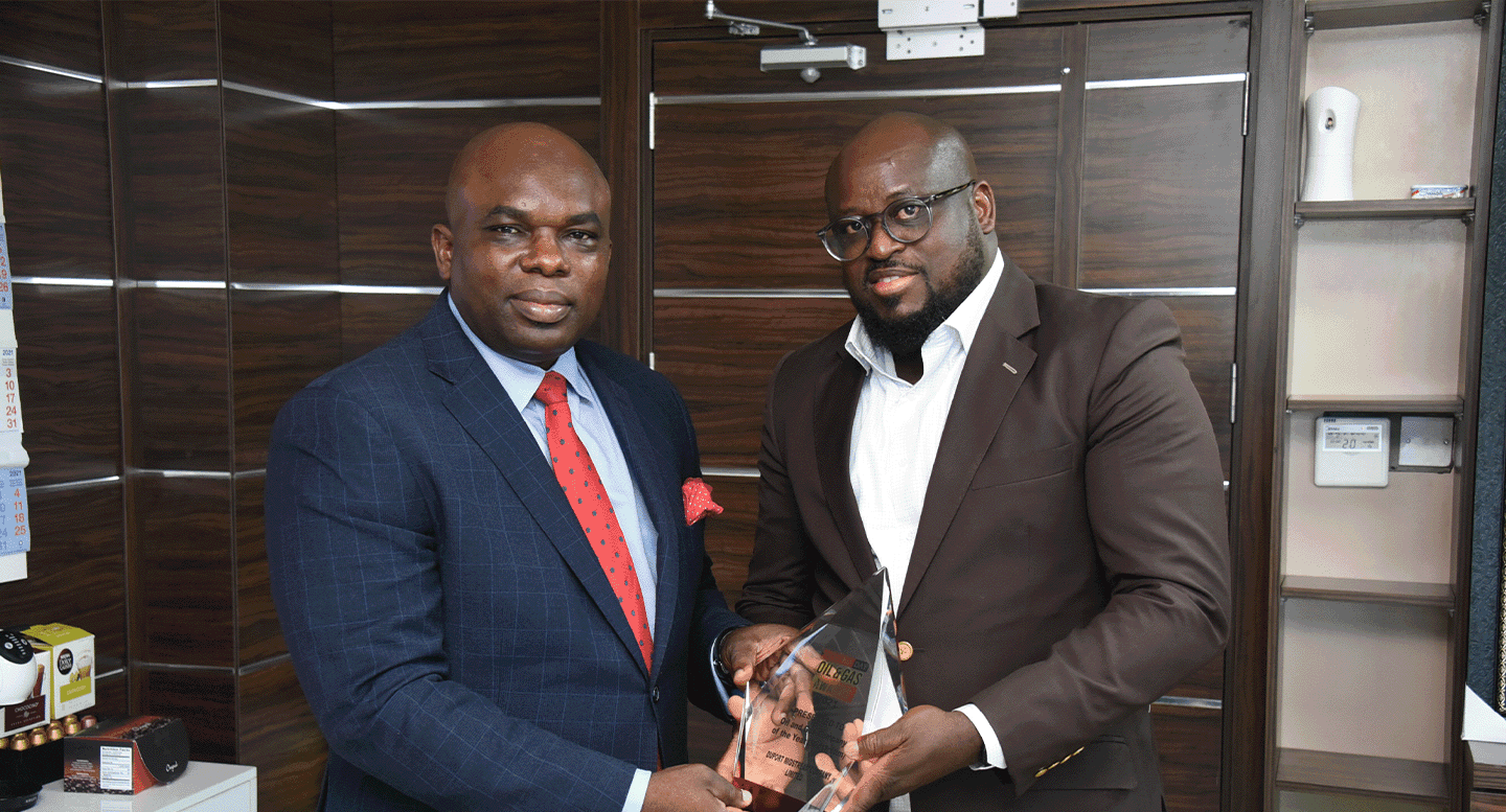 Dr Tayo Adiatu of tulcan energy receiving an award